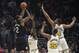 Los Angeles Clippers forward Kawhi Leonard, left, shoots as Golden State Warriors forward Draymond Green, second from left, Glenn Robinson III and forward Omari Spellman defend during the second half of an NBA basketball game Friday, Jan. 10, 2020, in Los Angeles. The Clippers won 109-100. (AP Photo/Mark J. Terrill)