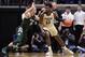 Purdue forward Trevion Williams (50) drives on Michigan State forward Thomas Kithier (15) during the first half of an NCAA college basketball game in West Lafayette, Ind., Sunday, Jan. 12, 2020. (AP Photo/Michael Conroy)