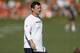 Denver Broncos offensive coordinator Rich Scangarello takes part in drills during an NFL football training camp session Monday, Aug. 5, 2019, in Englewood, Colo. (AP Photo/David Zalubowski)