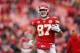 Kansas City Chiefs tight end Travis Kelce (87) warms up before an NFL divisional playoff football game against the Houston Texans, in Kansas City, Mo., Sunday, Jan. 12, 2020. (AP Photo/Jeff Roberson)