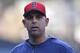 Boston Red Sox' Alex Cora looks on before the baseball game against the San Diego Padres Friday, Aug. 23, 2019, in San Diego. (AP Photo/Orlando Ramirez)