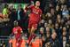 Liverpool's Brazilian midfielder Fabinho (C) jumps in celebrating scoring the opening goal of the English Premier League football match between Liverpool and Manchester City at Anfield in Liverpool, north west England on November 10, 2019. (Photo by Paul ELLIS / AFP) / RESTRICTED TO EDITORIAL USE. No use with unauthorized audio, video, data, fixture lists, club/league logos or 'live' services. Online in-match use limited to 120 images. An additional 40 images may be used in extra time. No video emulation. Social media in-match use limited to 120 images. An additional 40 images may be used in extra time. No use in betting publications, games or single club/league/player publications. / (Photo by PAUL ELLIS/AFP via Getty Images)