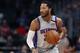 Detroit Pistons guard Derrick Rose brings the ball up court during the first half of an NBA basketball game, Monday, Jan. 13, 2020, in Detroit. (AP Photo/Carlos Osorio)