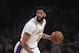 Los Angeles Lakers forward Anthony Davis dribbles during the first half of an NBA basketball game against the Detroit Pistons Sunday, Jan. 5, 2020, in Los Angeles. (AP Photo/Mark J. Terrill)