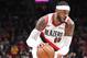 PORTLAND, OREGON - JANUARY 13: Carmelo Anthony #00 of the Portland Trail Blazers dribbles with the ball against the Charlotte Hornets in the first quarter during their game at Moda Center on January 13, 2020 in Portland, Oregon. (Photo by Abbie Parr/Getty Images)