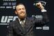 Conor McGregor motions to the crowd during a news conference for a UFC 246 mixed martial arts bout, Wednesday, Jan. 15, 2020, in Las Vegas. McGregor is scheduled to fight Donald