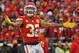 KANSAS CITY, MISSOURI - JANUARY 12: Strong safety Tyrann Mathieu #32 of the Kansas City Chiefs celebrates after a defensive stop in the first half during the AFC Divisional playoff game against the Houston Texans at Arrowhead Stadium on January 12, 2020 in Kansas City, Missouri. (Photo by Peter G. Aiken/Getty Images)