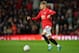 Manchester United's English defender Brandon Williams runs with the ball during the English FA Cup third round-replay football match between Manchester United and Wolverhampton Wanderers at Old Trafford in Manchester, north west England, on January 15, 2020. (Photo by Paul ELLIS / AFP) / RESTRICTED TO EDITORIAL USE. No use with unauthorized audio, video, data, fixture lists, club/league logos or 'live' services. Online in-match use limited to 120 images. An additional 40 images may be used in extra time. No video emulation. Social media in-match use limited to 120 images. An additional 40 images may be used in extra time. No use in betting publications, games or single club/league/player publications. / (Photo by PAUL ELLIS/AFP via Getty Images)