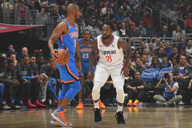 LOS ANGELES, CA - NOVEMBER 18: Patrick Beverley #21 of the LA Clippers plays defense against Chris Paul #3 of the Oklahoma City Thunder on November 18, 2019 at STAPLES Center in Los Angeles, California. NOTE TO USER: User expressly acknowledges and agrees that, by downloading and/or using this Photograph, user is consenting to the terms and conditions of the Getty Images License Agreement. Mandatory Copyright Notice: Copyright 2019 NBAE (Photo by Andrew D. Bernstein/NBAE via Getty Images)