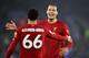 LEICESTER, ENGLAND - DECEMBER 26: Trent Alexander-Arnold of Liverpool celebrates with teammate Virgil van Dijk after scoring his team's fourth goal during the Premier League match between Leicester City and Liverpool FC at The King Power Stadium on December 26, 2019 in Leicester, United Kingdom. (Photo by Alex Pantling/Getty Images)