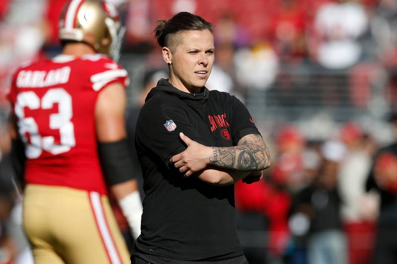 SANTA CLARA, CALIFORNIA - DECEMBER 15: San Francisco 49ers offensive assistant coach Katie Sowers looks on during the warm up before the game against the Atlanta Falcons at Levi's Stadium on December 15, 2019 in Santa Clara, California. (Photo by Lachlan Cunningham/Getty Images)