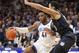 Villanova forward Saddiq Bey (41) moves around Butler forward Bryce Nze (10) during the first half of an NCAA college basketball game, Tuesday, Jan. 21, 2020, in Villanova, Pa. (AP Photo/Laurence Kesterson)