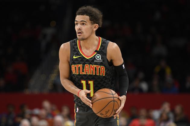 Atlanta Hawks guard Trae Young (11) handles the ball during the first half of an NBA basketball game against the Washington Wizards, Friday, Jan. 10, 2020, in Washington. (AP Photo/Nick Wass)
