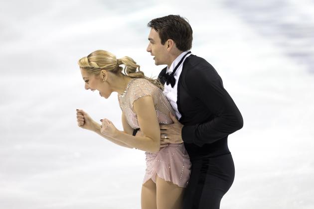 Alexa Knierim and Christopher Knierim react at the completion of their program in the senior pairs at the U.S. Figure Skating Championships Thursday, Jan. 23, 2020 in Greensboro, N.C. They are in currently in first place after the program. (AP Photo/Lynn Hey)