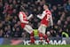 LONDON, ENGLAND - JANUARY 21: Gabriel Martinelli of Arsenal celebrates with teammate Bukayo Saka after scoring his team's first goal during the Premier League match between Chelsea FC and Arsenal FC at Stamford Bridge on January 21, 2020 in London, United Kingdom. (Photo by Harriet Lander/Copa/Getty Images)