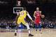 PHILADELPHIA, PA - JANUARY 25: Ben Simmons #25 of the Philadelphia 76ers dribbles the ball against LeBron James #23 of the Los Angeles Lakers in the second quarter at the Wells Fargo Center on January 25, 2020 in Philadelphia, Pennsylvania. The 76ers defeated the Lakers 108-91. NOTE TO USER: User expressly acknowledges and agrees that, by downloading and/or using this photograph, user is consenting to the terms and conditions of the Getty Images License Agreement. (Photo by Mitchell Leff/Getty Images)