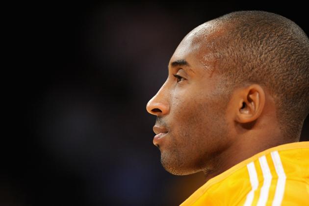 LOS ANGELES - NOVEMBER 24:  Kobe Bryant #24 of the Los Angeles Lakers looks across the court before the game against the New York Knicks on November 24, 2009 at Staples Center in Los Angeles, California.  The Lakers won 100-90.  NOTE TO USER: User expressly acknowledges and agrees that, by downloading and/or using this Photograph, user is consenting to the terms and conditions of the Getty Images License Agreement. Mandatory Copyright Notice: Copyright 2009 NBAE (Photo by Noah Graham/NBAE via Getty Images)