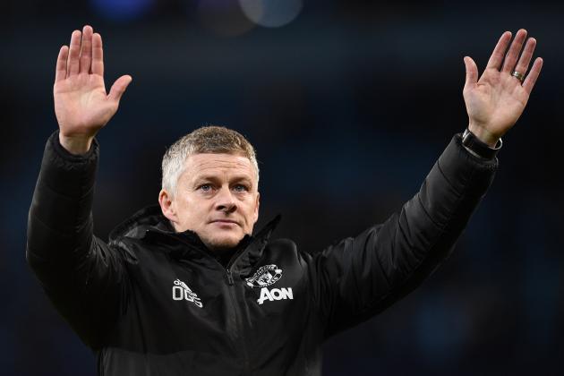 Manchester United's Norwegian manager Ole Gunnar Solskjaer applauds the fans following the English League Cup semi-final second leg football match between Manchester City and Manchester United at the Etihad Stadium in Manchester, north west England, on January 29, 2020. - Manchester City booked their place in a third successive League Cup final, but made hard work of disposing of Manchester United 3-2 on aggregate after losing the second leg of their semi-final 1-0 at home on Wednesday. (Photo by Oli SCARFF / AFP) / RESTRICTED TO EDITORIAL USE. No use with unauthorized audio, video, data, fixture lists, club/league logos or 'live' services. Online in-match use limited to 120 images. An additional 40 images may be used in extra time. No video emulation. Social media in-match use limited to 120 images. An additional 40 images may be used in extra time. No use in betting publications, games or single club/league/player publications. /  (Photo by OLI SCARFF/AFP via Getty Images)