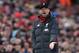 Liverpool's German manager Jurgen Klopp reacts during the English Premier League football match between Liverpool and Southampton at Anfield in Liverpool, north west England on February 1, 2020. (Photo by Paul ELLIS / AFP) / RESTRICTED TO EDITORIAL USE. No use with unauthorized audio, video, data, fixture lists, club/league logos or 'live' services. Online in-match use limited to 120 images. An additional 40 images may be used in extra time. No video emulation. Social media in-match use limited to 120 images. An additional 40 images may be used in extra time. No use in betting publications, games or single club/league/player publications. / (Photo by PAUL ELLIS/AFP via Getty Images)
