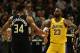 MILWAUKEE, WISCONSIN - DECEMBER 19: Giannis Antetokounmpo #34 of the Milwaukee Bucks and LeBron James #23 of the Los Angeles Lakers hug following a game at Fiserv Forum on December 19, 2019 in Milwaukee, Wisconsin. NOTE TO USER: User expressly acknowledges and agrees that, by downloading and or using this photograph, User is consenting to the terms and conditions of the Getty Images License Agreement. (Photo by Stacy Revere/Getty Images)