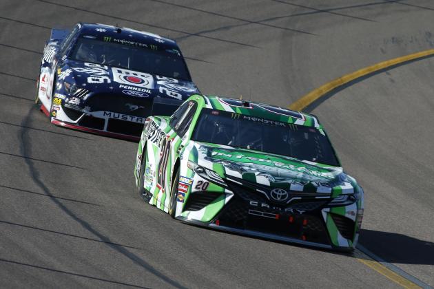 Erik Jones (20) and Brad Keselowski (2) during the NASCAR Cup Series auto race at ISM Raceway, Sunday, Nov. 10, 2019, in Avondale, Ariz. (AP Photo/Ralph Freso)