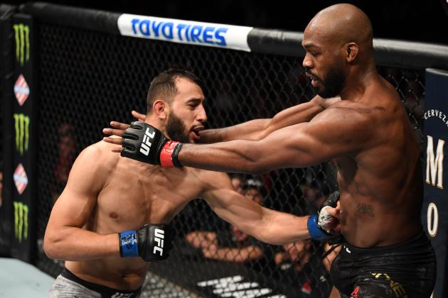 HOUSTON, TEXAS - FEBRUARY 08:  (L-R) Dominick Reyes punches Jon Jones in their light heavyweight championship bout during the UFC 247 event at Toyota Center on February 08, 2020 in Houston, Texas. (Photo by Josh Hedges/Zuffa LLC via Getty Images)