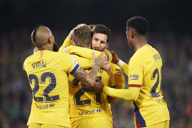 SEVILLE, SPAIN - FEBRUARY 09: Frenkie de Jong of FC Barcelona 
celebrates with his teammate Lionel Messiof FC Barcelona after scoring the opening goal during the Liga match between Real Betis Balompie and FC Barcelona at Estadio Benito Villamarin on February 09, 2020 in Seville, Spain. (Photo by Aitor Alcalde/Getty Images)