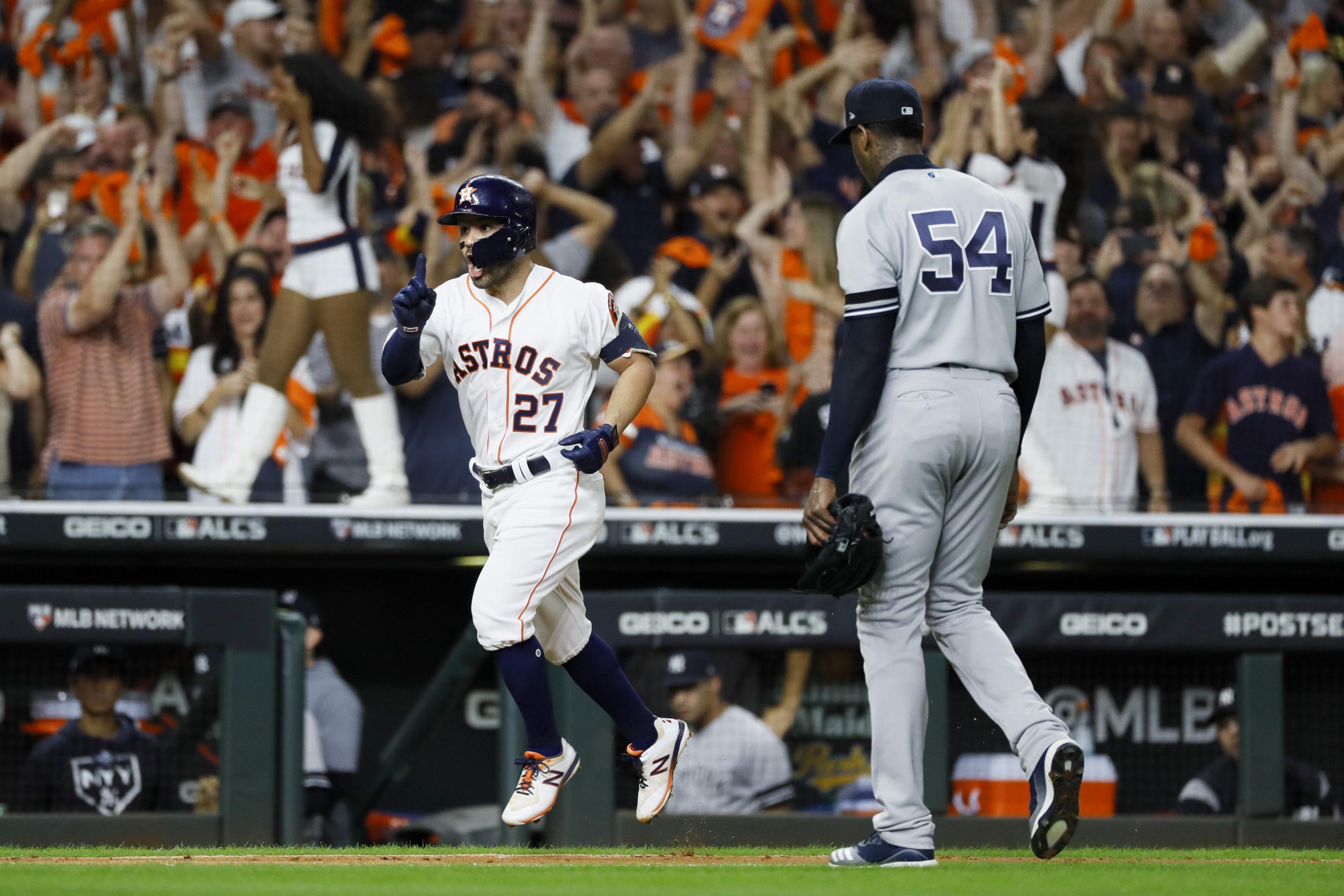 Astros' Jose Altuve gets jersey ripped off after game-winning