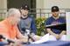 WEST PALM BEACH, FLORIDA - FEBRUARY 13: Alex Bregman #2 and Jose Altuve #27 of the Houston Astros look on as owner Jim Crane reads a prepared statement during a press conference at FITTEAM Ballpark of The Palm Beaches on February 13, 2020 in West Palm Beach, Florida. (Photo by Michael Reaves/Getty Images)