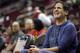 Dallas Mavericks' owner Mark Cuban watches his team warm up before an NBA basketball game against the Houston Rockets Sunday, Nov. 24, 2019, in Houston. (AP Photo/David J. Phillip)