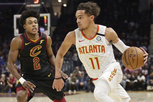 Atlanta Hawks' Trae Young (11) drives against Cleveland Cavaliers' Collin Sexton (2) in the second half of an NBA basketball game, Wednesday, Feb. 12, 2020, in Cleveland. (AP Photo/Tony Dejak)