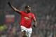 Manchester United's French midfielder Paul Pogba makes a run during the English Premier League football match between Manchester United and Newcastle United at Old Trafford in Manchester, north west England, on December 26, 2019. (Photo by Paul ELLIS / AFP) / RESTRICTED TO EDITORIAL USE. No use with unauthorized audio, video, data, fixture lists, club/league logos or 'live' services. Online in-match use limited to 120 images. An additional 40 images may be used in extra time. No video emulation. Social media in-match use limited to 120 images. An additional 40 images may be used in extra time. No use in betting publications, games or single club/league/player publications. / (Photo by PAUL ELLIS/AFP via Getty Images)