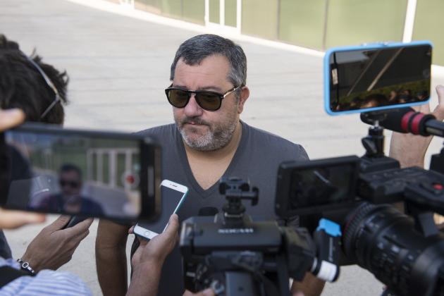 TURIN, ITALY - JULY 17: Agent Mino Raiola accompanies Matthijs De Ligt as he arrives in Turin ahead of his signing with Juventus FC on July 17, 2019 in Turin, Italy. (Photo by Stefano Guidi/Getty Images)