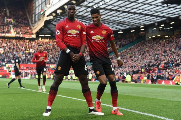 Manchester United's French midfielder Paul Pogba (L) celebrates with Manchester United's English forward Marcus Rashford after he scores the team's second goal from a second penalty during the English Premier League football match between Manchester United and West Ham United at Old Trafford in Manchester, north west England, on April 13, 2019. (Photo by Paul ELLIS / AFP) / RESTRICTED TO EDITORIAL USE. No use with unauthorized audio, video, data, fixture lists, club/league logos or 'live' services. Online in-match use limited to 120 images. An additional 40 images may be used in extra time. No video emulation. Social media in-match use limited to 120 images. An additional 40 images may be used in extra time. No use in betting publications, games or single club/league/player publications. /         (Photo credit should read PAUL ELLIS/AFP via Getty Images)