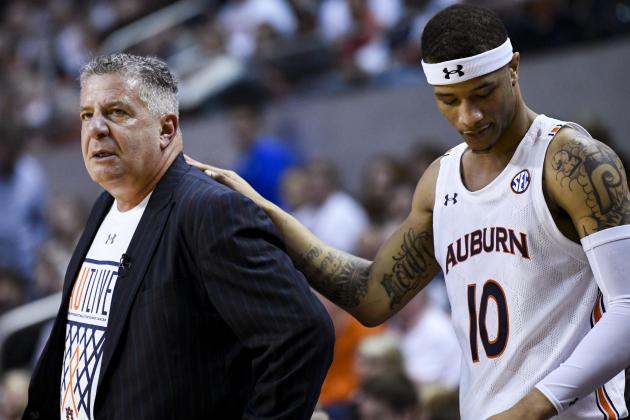 Auburn guard Samir Doughty (10) stands with coach Bruce Pearl after a foul call during the first half of the team's NCAA college basketball game against Kentucky on Saturday, Feb. 1, 2020, in Auburn, Ala. (AP Photo/Julie Bennett)