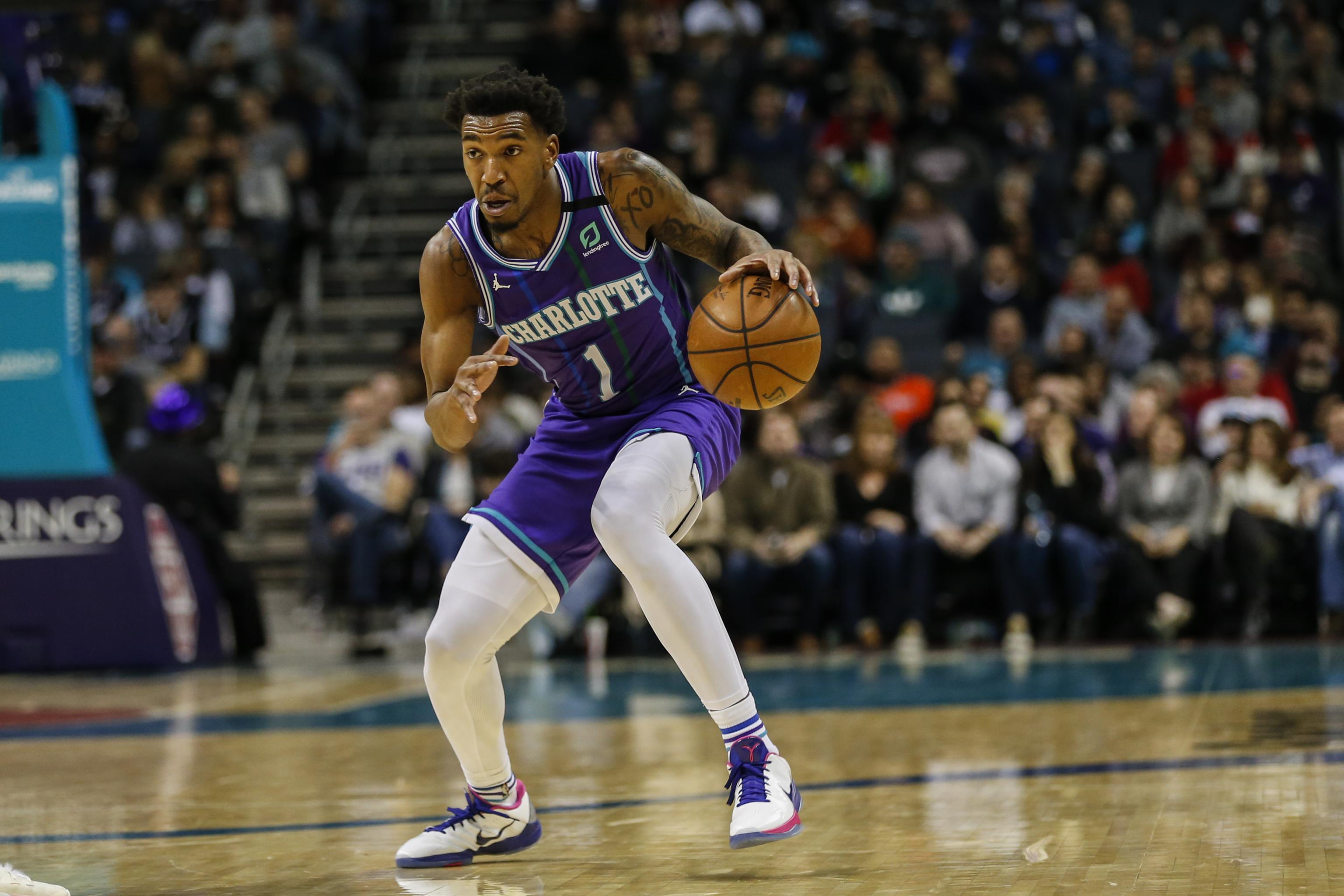 Malik Monk of the Charlotte Hornets reacts to a play during the game