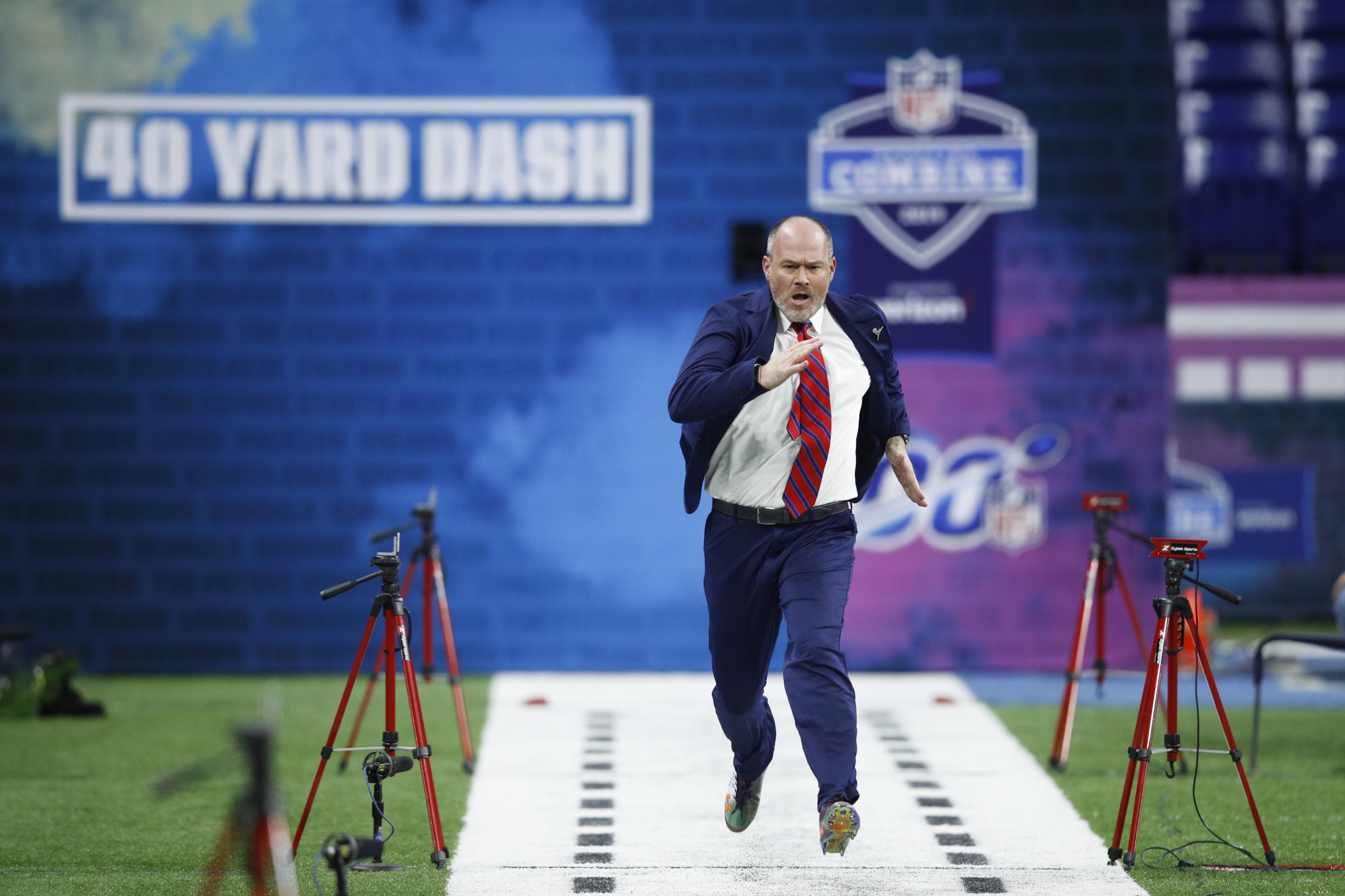 Rich Eisen's dash brings in charity cash at NFL Combine – Orange County  Register