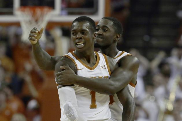 Texas guard Andrew Jones (1) and guard Courtney Ramey (3) celebrate a score against Kansas during the first half of an NCAA college basketball game, Saturday, Jan. 18, 2020, in Austin, Texas. (AP Photo/Eric Gay)