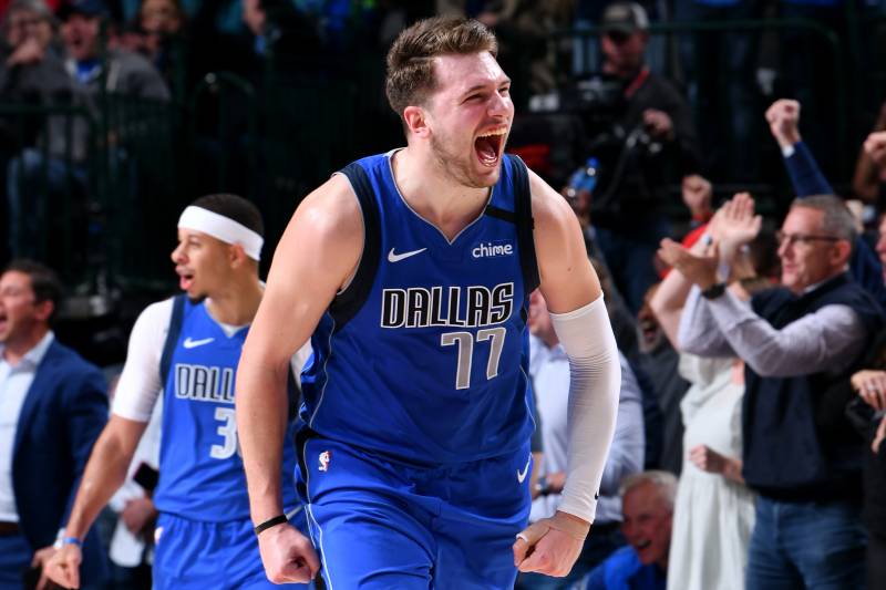 DALLAS, TX - MARCH 4: Luka Doncic #77 of the Dallas Mavericks reacts to a play during the game against the New Orleans Pelicans on March 4, 2020 at the American Airlines Center in Dallas, Texas. NOTE TO USER: User expressly acknowledges and agrees that, by downloading and or using this photograph, User is consenting to the terms and conditions of the Getty Images License Agreement. Mandatory Copyright Notice: Copyright 2020 NBAE (Photo by Glenn James/NBAE via Getty Images)