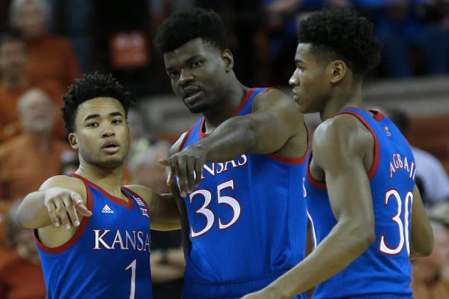 AUSTIN, TEXAS - JANUARY 18: Devon Dotson #1, Udoka Azubuike #35 and Ochai Agbaji #30 of the Kansas Jayhawks talk strategy before the game with the Texas Longhorns at The Frank Erwin Center on January 18, 2020 in Austin, Texas. (Photo by Chris Covatta/Getty Images)