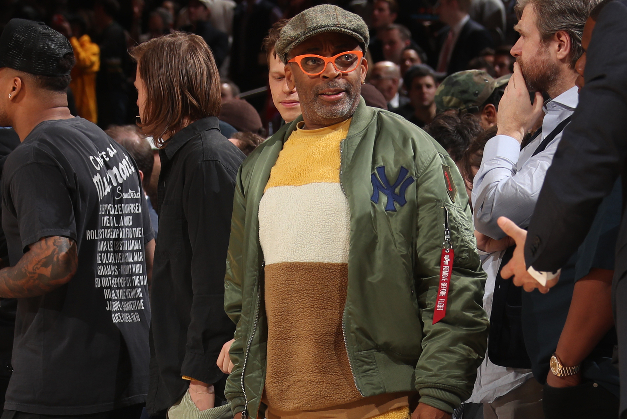 Celebrity film director and New York Knicks fan Spike Lee wearing
