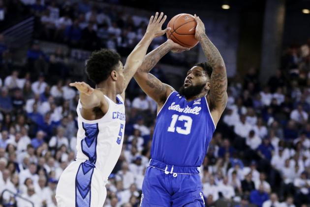 Seton Hall's Myles Powell (13) shoots against Creighton's Ty-Shon Alexander (5) during the first half of an NCAA college basketball game in Omaha, Neb., Saturday, March 7, 2020. (AP Photo/Nati Harnik)