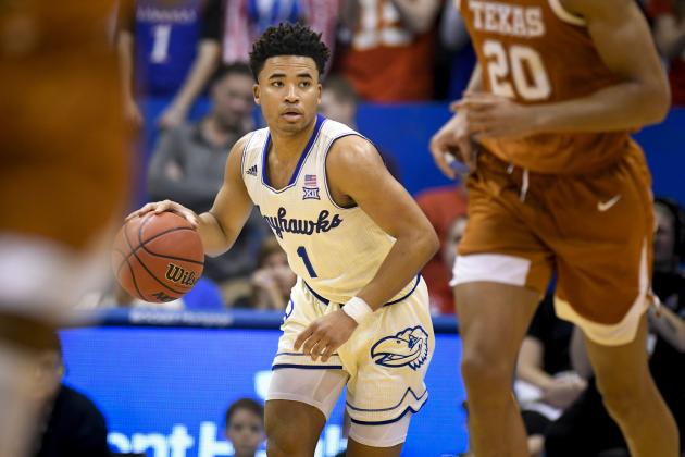 Kansas Jayhawks guard Devon Dotson (1) brings the ball downcourt against Texas during the second half of an NCAA college basketball game in Lawrence, Kan., Monday, Feb. 3, 2020. (AP Photo/Reed Hoffmann)