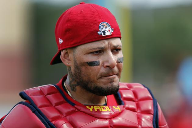 St. Louis Cardinals catcher Yadier Molina walks to the dugout just prior to the start of a spring training baseball game against the Miami Marlins Wednesday, Feb. 26, 2020, in Jupiter, Fla. (AP Photo/Jeff Roberson)