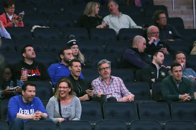 A few fans watch the second half of an NCAA college basketball game between DePaul and Xavier in the first round of the Big East men's tournament Wednesday, March 11, 2020, in New York. Trying to avoid spreading the new coronavirus that has become a global pandemic, the NCAA on Wednesday decided the men’s and women’s Division I tournament games will be off-limits to the general public. The major college conferences followed the NCAA's lead, one by one announcing their league tournaments would go on the rest of the week with restricted fan access. (AP Photo/Kathy Willens)