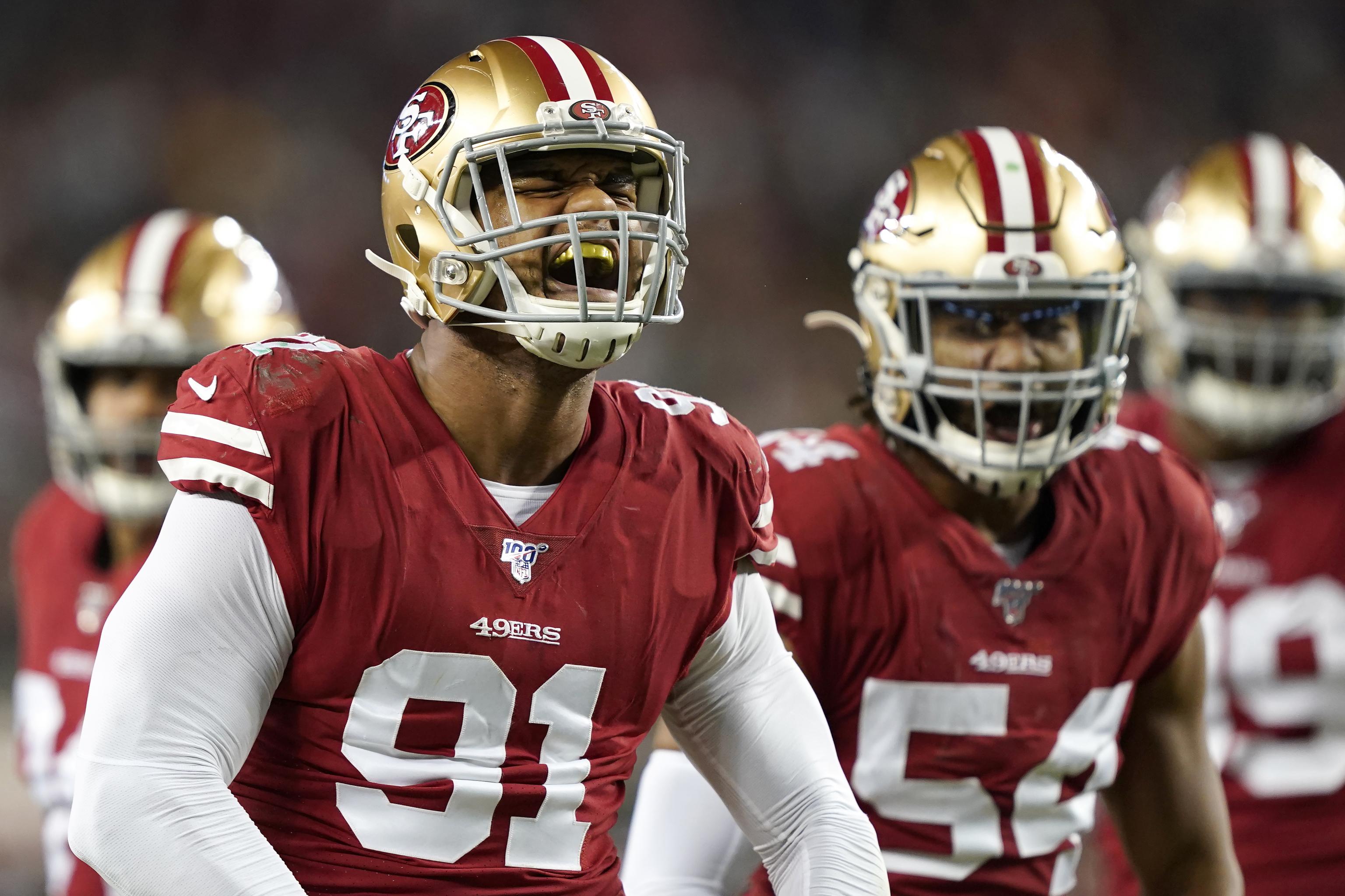 49ers shake up defensive line, keeping Arik Armstead and trading