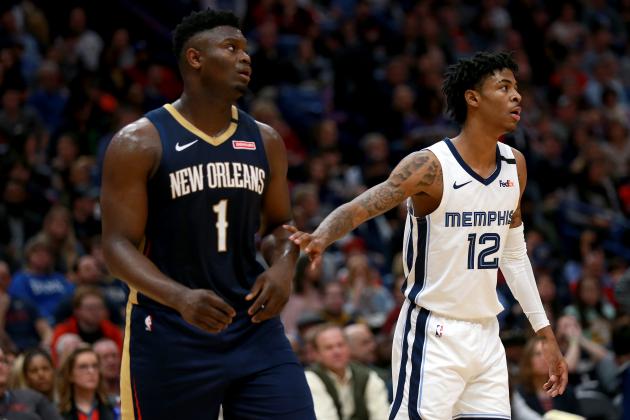 NEW ORLEANS, LOUISIANA - JANUARY 31: Zion Williamson #1 of the New Orleans Pelicans and Ja Morant #12 of the Memphis Grizzlies stand on the court during a NBA game at Smoothie King Center on January 31, 2020 in New Orleans, Louisiana. NOTE TO USER: User expressly acknowledges and agrees that, by downloading and or using this photograph, User is consenting to the terms and conditions of the Getty Images License Agreement. (Photo by Sean Gardner/Getty Images)