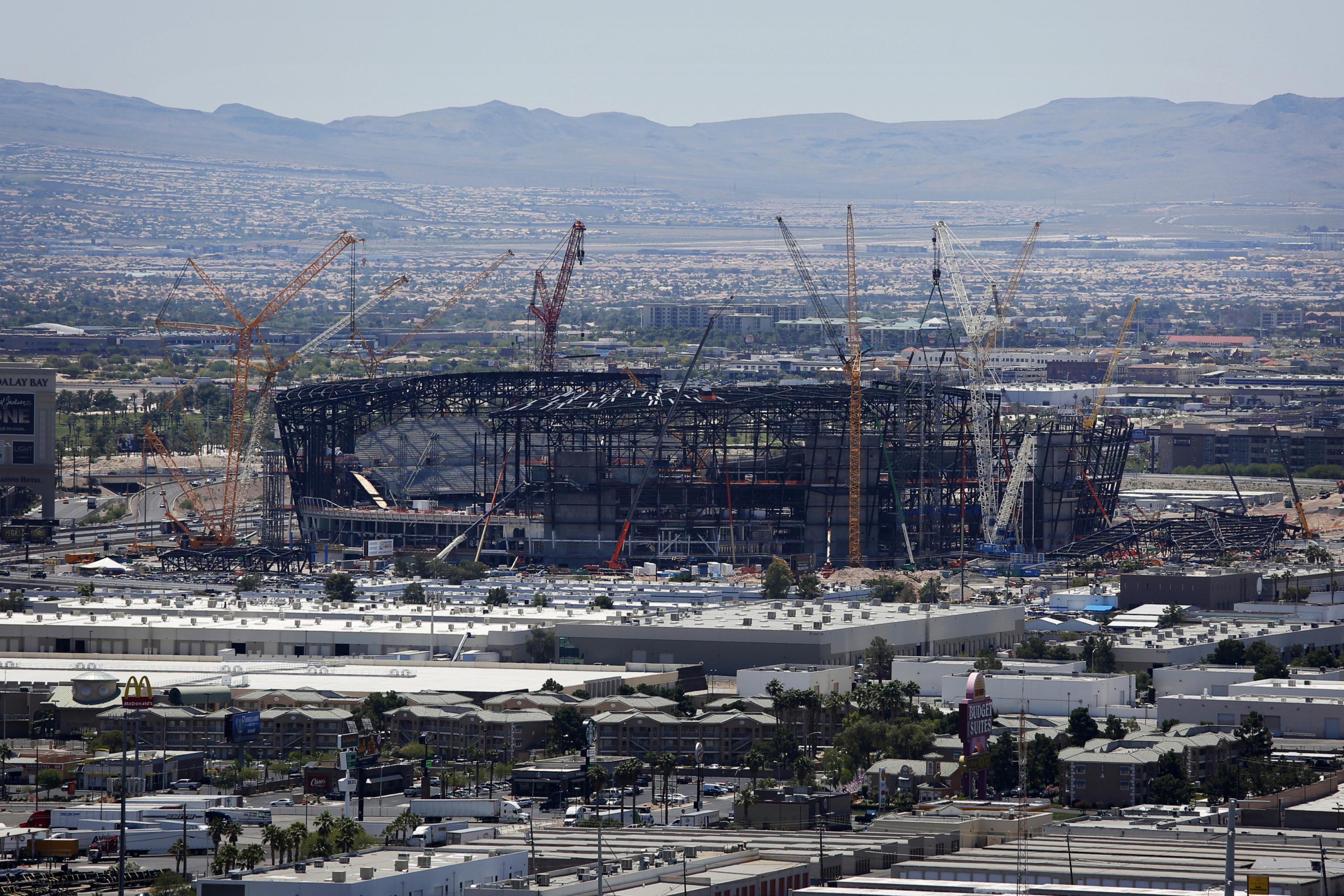 General overall view of Los Angeles Chargers and Las Vegas Raiders helmets  at the Allegiant Stadium construction site, Monday, May 11, 2020, in Las  Vegas. The stadium will be the home of