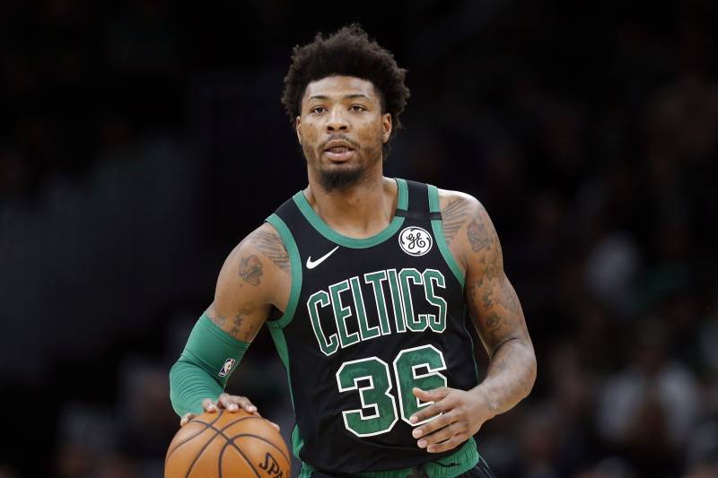 Boston Celtics' Marcus Smart plays against against the Oklahoma City Thunder during an NBA basketball game, Sunday, March, 8, 2020, in Boston. (AP Photo/Michael Dwyer)