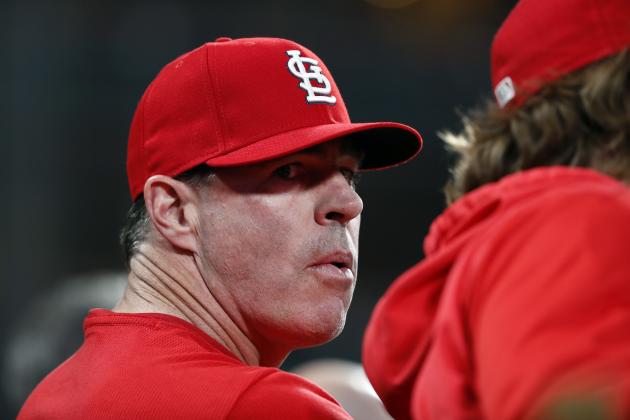 Former St. Louis Cardinals center fielder Jim Edmonds is seen in the Cardinals' dugout during a baseball game against the Cincinnati Reds Friday, April 26, 2019, in St. Louis. (AP Photo/Jeff Roberson)